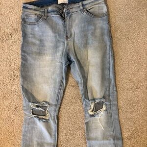 Distressed Light Blue Jeans